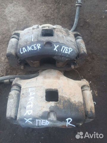 Суппорт передний правый Mitsubishi Lancer X CX