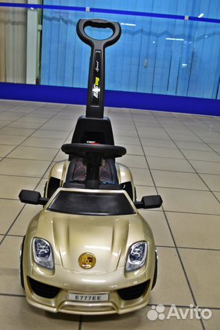 Детский электромобиль-каталка с ручкой управления Детский электромобиль-каталка с ручкой управления