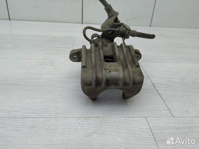 Суппорт задний левый 1K0615423J Skoda Octavia (A5 Суппорт задний левый 1K0615423J Skoda Octavia (A5