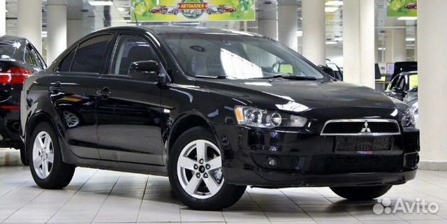 Mitsubishi Lancer 10 решетка бампера