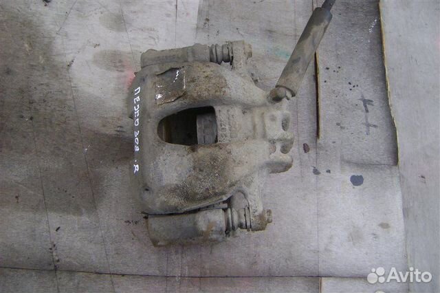 Суппорт тормозной передний правый Peugeot 308 4A/C