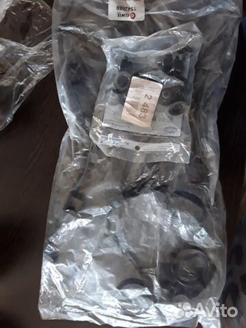 Прокладка и маслосъемные колпачки для авео 1,4