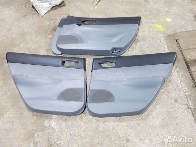 Обшивка двери mazda 6 gg