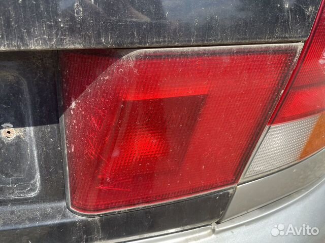 Фонарь крышки багажника Mitsubishi Carisma хетч