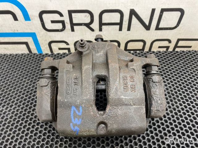 Суппорт передний левый Kia Sportage 3