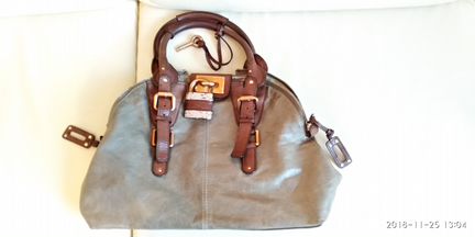 Шикарная женская кожаная сумка с большим замком