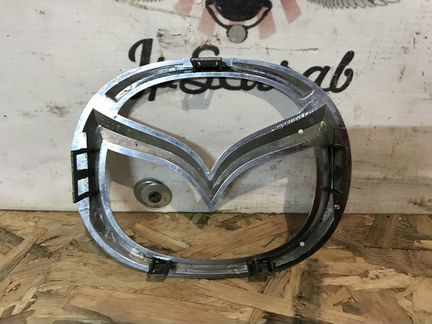 Эмблема решетки радиатора Mazda 3 BK