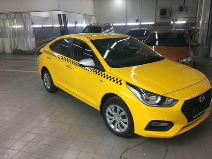 Оклейка такси пленкой