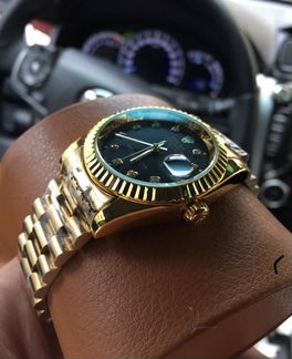 Часы Rolex золотые