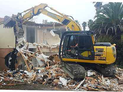 Демонтаж зданий, строений, вывоз строительного мус
